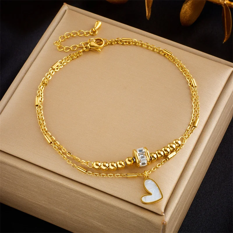 18K Gold Plated Layered Heart Bracelet, Mother of Pearl Charm with CZ Spacer, Delicate Stainless Steel Stackable Jewelry
18K Gold Plated Layered Heart Bracelet, Mother of Pearl Charm with CZ Spacer, Delicate Stainless Steel Stackable Jewelry