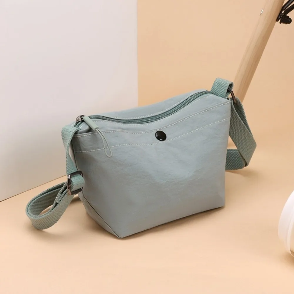 Solid Color Nylon Messenger Bag Korean Style Dumpling Shape Canvas Crossbody Bag Light Weight Large Capacity Single Shoulder Bag
Solid Color Nylon Messenger Bag Korean Style Dumpling Shape Canvas Crossbody Bag Light Weight Large Capacity Single Shoulder Bag