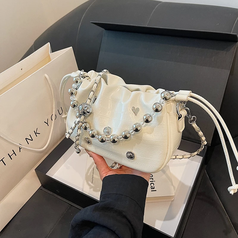 High end pleated drawstring bucket bag for women in summer 2024, fashionable and simple single shoulder bag, crossbody bag
High end pleated drawstring bucket bag for women in summer 2024, fashionable and simple single shoulder bag, crossbody bag
