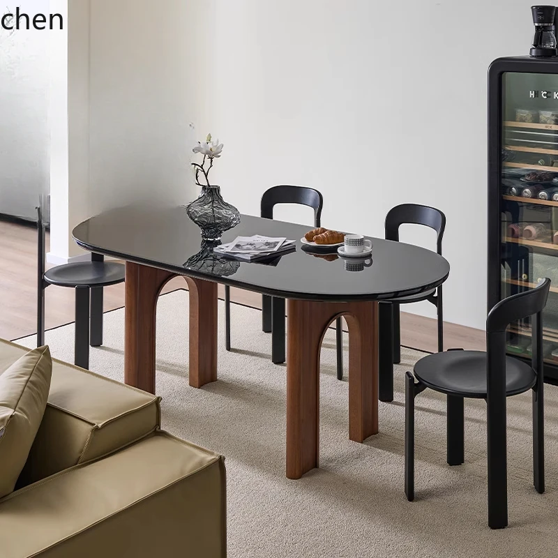 CP wabi sandy wind solid wood oval small apartment household walnut tempered glass dining table
CP wabi sandy wind solid wood oval small apartment household walnut tempered glass dining table
