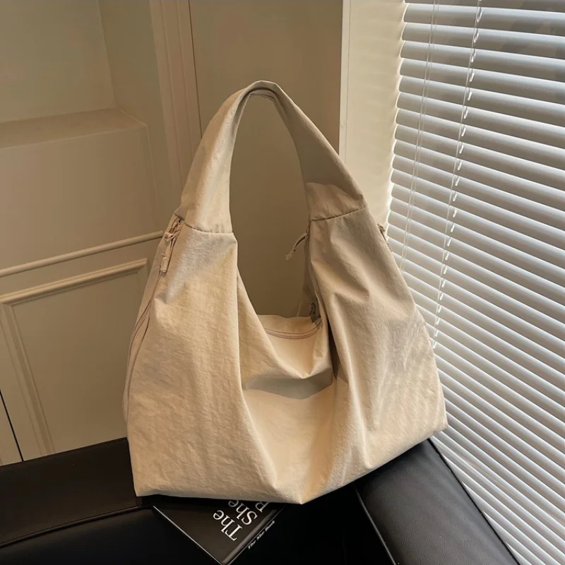 Повседневная сумка через плечо с несколькими карманами и двойной молнией, большая вместительная сумка, модные однотонные сумки 2025 года, сумка для покупок
Повседневная сумка через плечо с несколькими карманами и двойной молнией, большая вместительная сумка, модные однотонные сумки 2025 года, сумка для покупок