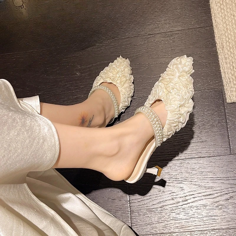 Women 2026 Spring French Pointed Toe Pearl Cool Drag Summer Stiletto High Heel Slippers
Women 2026 Spring French Pointed Toe Pearl Cool Drag Summer Stiletto High Heel Slippers