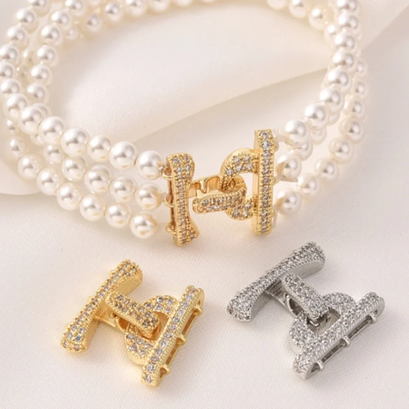 1 Piece Copper Gold-plated Micro-set Zirconia Jewelry Clasp DIY Bracelet Necklace Pearl Chain Sweater Chain Accessorie Wholesale
1 Piece Copper Gold-plated Micro-set Zirconia Jewelry Clasp DIY Bracelet Necklace Pearl Chain Sweater Chain Accessorie Wholesale