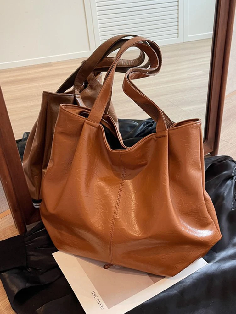 Vintage Large Capacity Tote Bag 2024 New Trendy Soft Leather Women's Shoulder Bags Simple Versatile Shopping Commuting Handbags
Vintage Large Capacity Tote Bag 2024 New Trendy Soft Leather Women's Shoulder Bags Simple Versatile Shopping Commuting Handbags