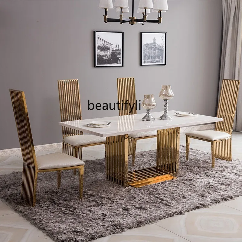 Marble dining table Nordic high-grade stainless steel light luxury dining table and chair combination living room rectangle
Marble dining table Nordic high-grade stainless steel light luxury dining table and chair combination living room rectangle