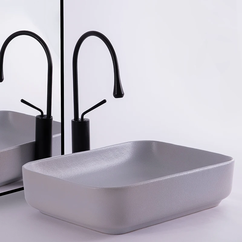Colored large-sized rectangular tabletop basin, ceramic, household balcony washbasin, single basin
Colored large-sized rectangular tabletop basin, ceramic, household balcony washbasin, single basin