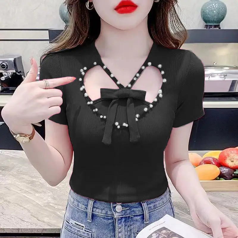 2024 New Summer Sweet Fashion Elegant Slim Fit V-neck Short Sleeved Bow Solid Color Hollow Out Diamonds Women's T-shirt Top
2024 New Summer Sweet Fashion Elegant Slim Fit V-neck Short Sleeved Bow Solid Color Hollow Out Diamonds Women's T-shirt Top