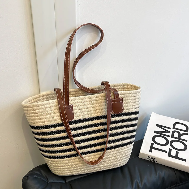 Woven grass woven bag for women, large capacity 2024 new summer versatile shoulder bag, textured commuting beach bag
Woven grass woven bag for women, large capacity 2024 new summer versatile shoulder bag, textured commuting beach bag