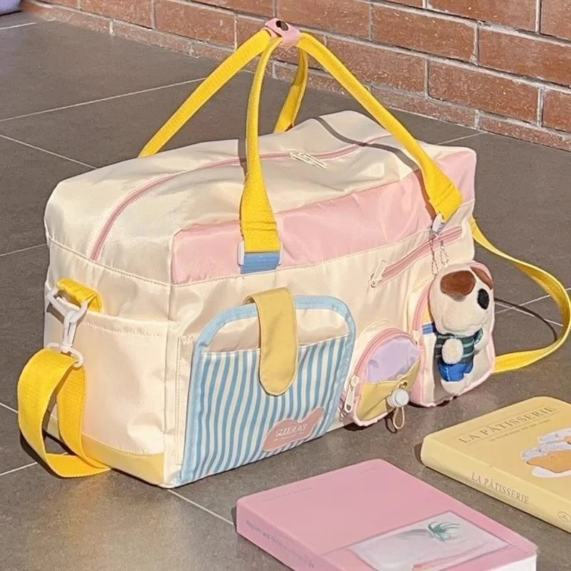 Большая вместительная женская дорожная сумка, модный ручной чемодан для коротких поездок, легкая сумка для хранения вещей, сумочка.
Большая вместительная женская дорожная сумка, модный ручной чемодан для коротких поездок, легкая сумка для хранения вещей, сумочка.