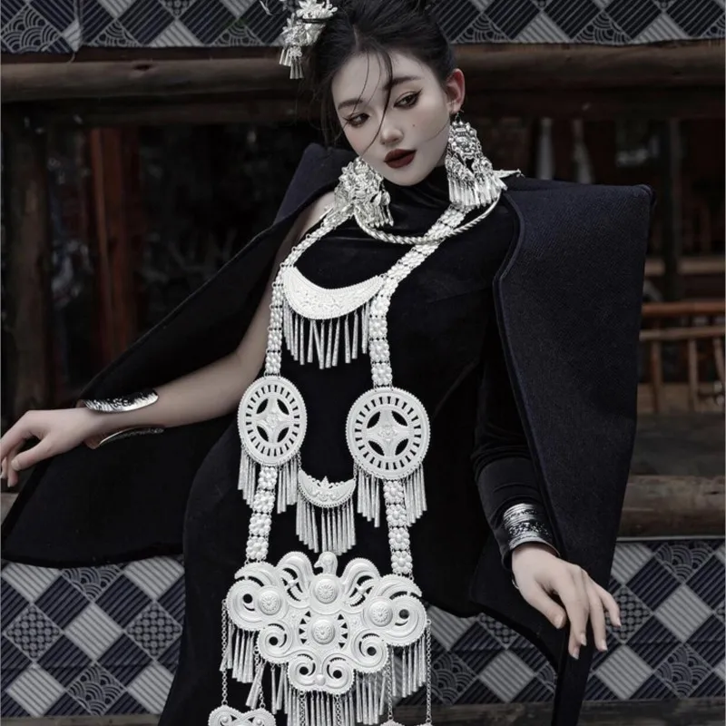 A photo shoot of black dress set for new women's in the ethnic style Liangshan
A photo shoot of black dress set for new women's in the ethnic style Liangshan