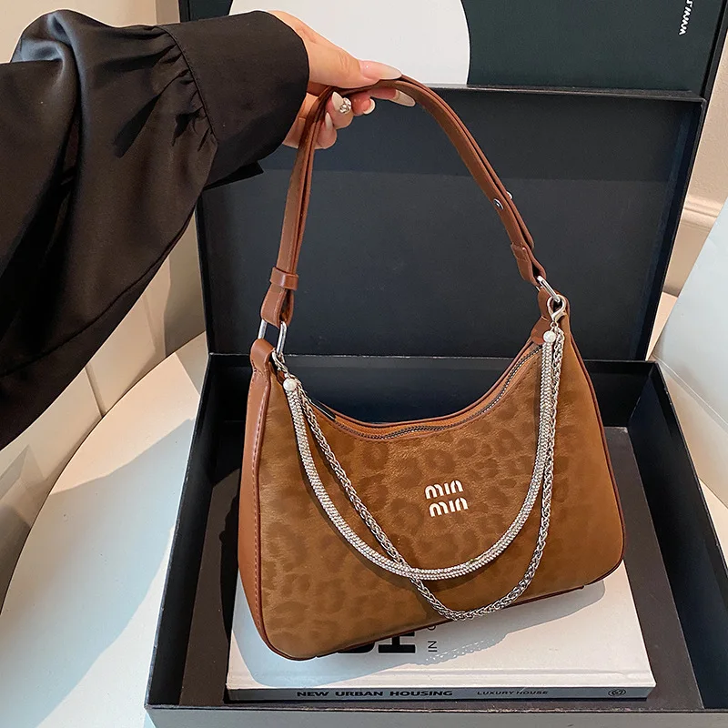 Винтажная сумка через плечо с цепочкой 2024, повседневная женская сумка с верхней ручкой, сумка через плечо в стиле ретро, минималистичная сумка «день-ночь», текстурированная
Винтажная сумка через плечо с цепочкой 2024, повседневная женская сумка с верхней ручкой, сумка через плечо в стиле ретро, минималистичная сумка «день-ночь», текстурированная