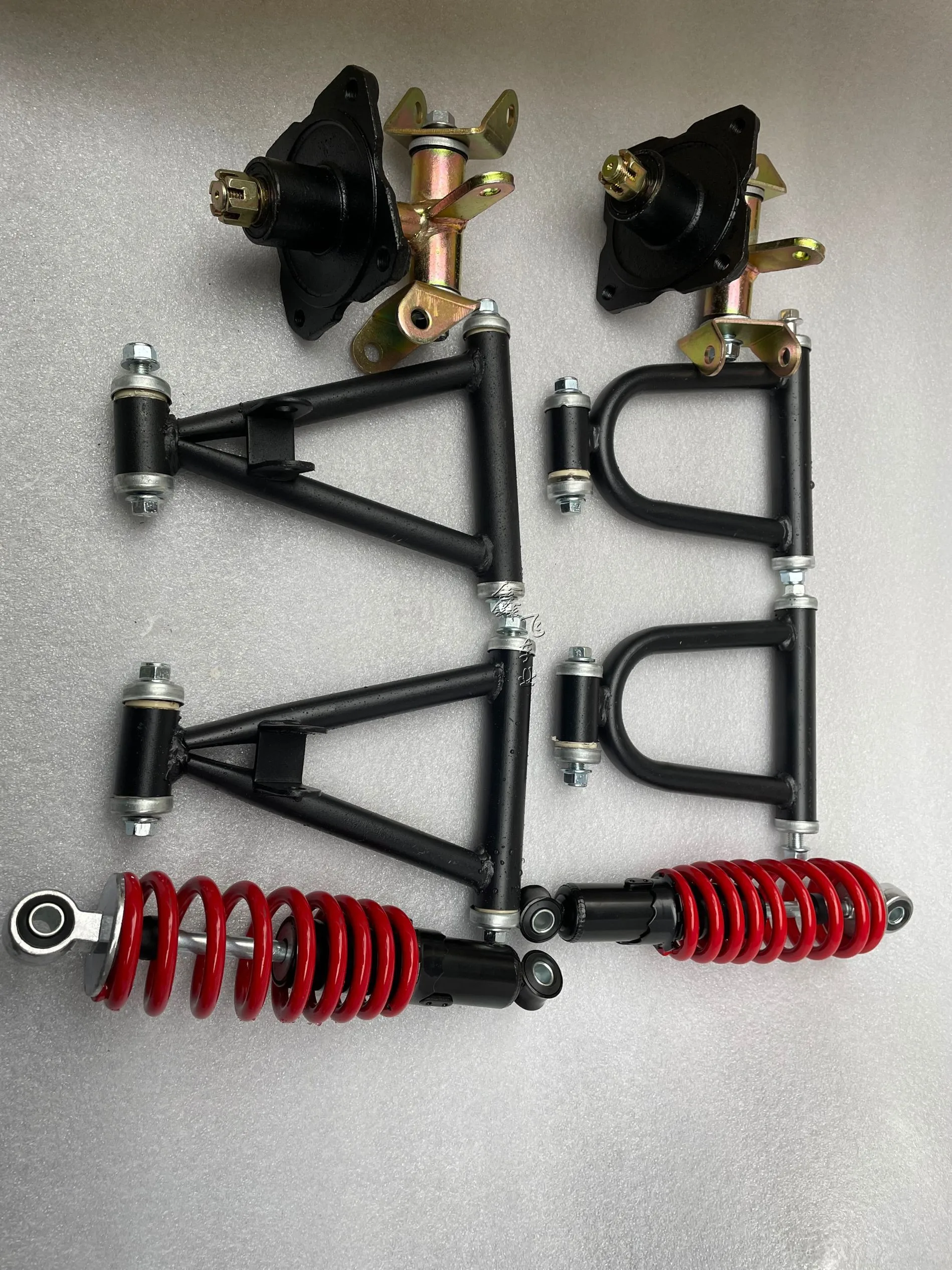 Modified four-wheel electric motorcycle kart beach car front suspension rocker arm steering claw flange shock absorption
Modified four-wheel electric motorcycle kart beach car front suspension rocker arm steering claw flange shock absorption