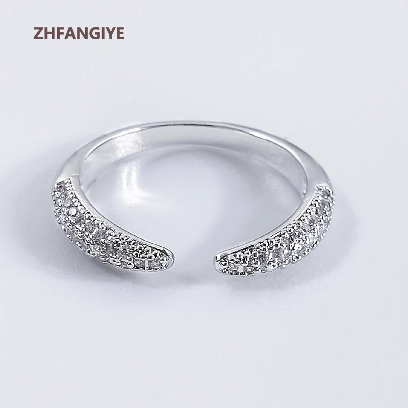 ZHFANGIYE Trendy 925 Silver Jewelry Ring with Zircon Gemstone for Women Wedding Party Accessories Open Finger Rings Wholesale
ZHFANGIYE Trendy 925 Silver Jewelry Ring with Zircon Gemstone for Women Wedding Party Accessories Open Finger Rings Wholesale