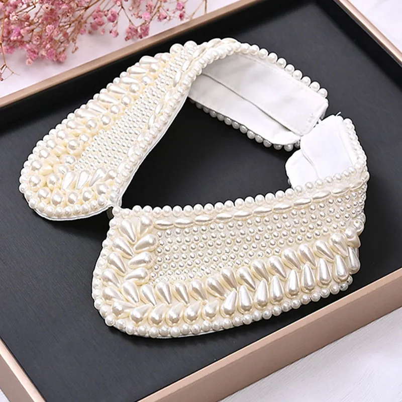 Женские съемные воротники с блестками и бисером, искусственные белые, черные накладные воротники, женский галстук, модный съемный женский искусственный воротник с бриллиантами
Женские съемные воротники с блестками и бисером, искусственные белые, черные накладные воротники, женский галстук, модный съемный женский искусственный воротник с бриллиантами