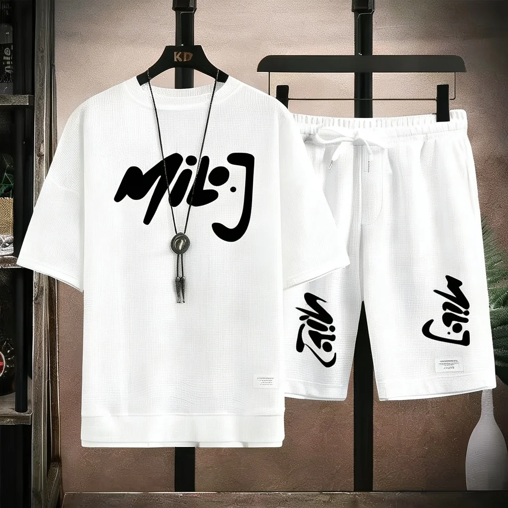 Graffiti Style Waffle Tracksuit Men "Mil·J" Brush Letter Graphic T-Shirt And Shorts Set Fashion Outfit 2026
Graffiti Style Waffle Tracksuit Men "Mil·J" Brush Letter Graphic T-Shirt And Shorts Set Fashion Outfit 2026