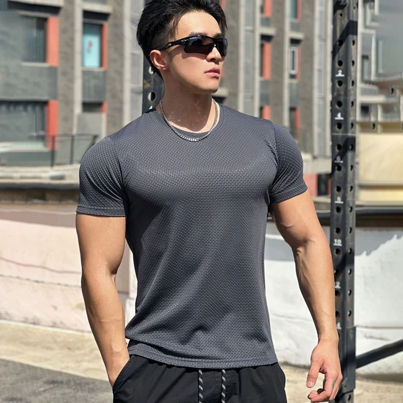 New men's casual round neck short sleeve T-shirt men's top bubble texture grain trend elastic quick drying breathable sportswear
New men's casual round neck short sleeve T-shirt men's top bubble texture grain trend elastic quick drying breathable sportswear
