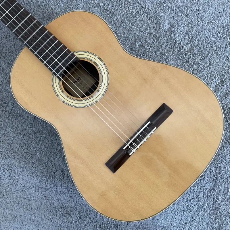 I747 Tribute Classical Guitar Solid Spruce Top with India Rosewood Body Nylon String Folk Guitar
I747 Tribute Classical Guitar Solid Spruce Top with India Rosewood Body Nylon String Folk Guitar