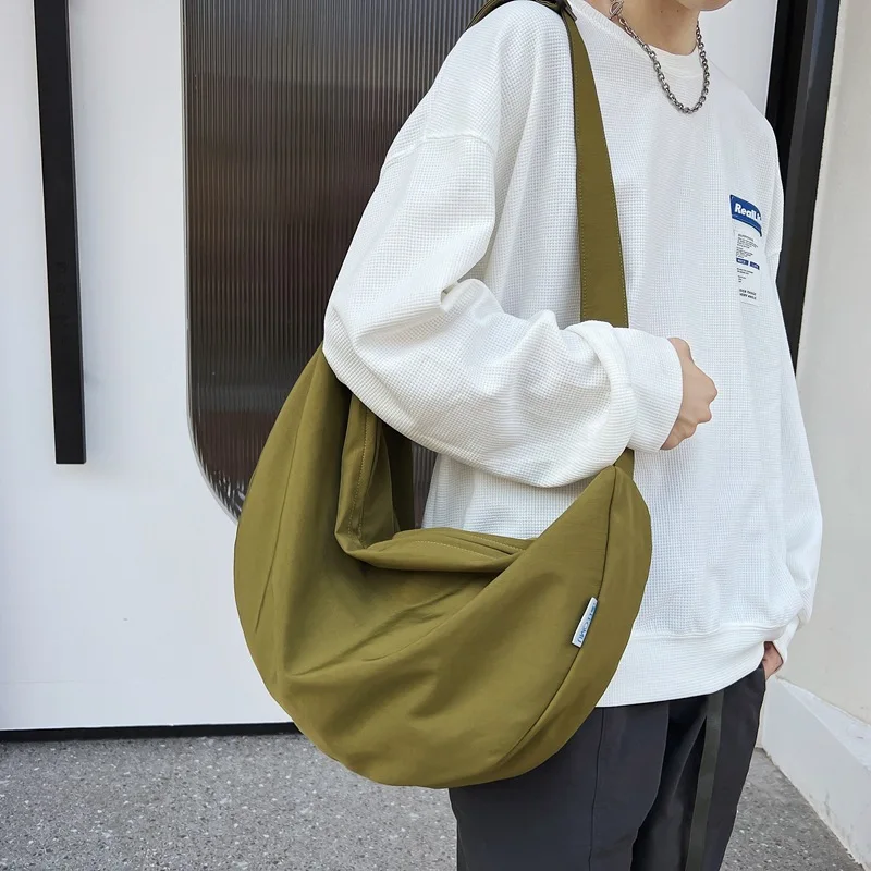 Nylon Travel Solid Color Casual Large Capacity Single Shoulder Crossbody Dumpling Bag Men Women
Nylon Travel Solid Color Casual Large Capacity Single Shoulder Crossbody Dumpling Bag Men Women