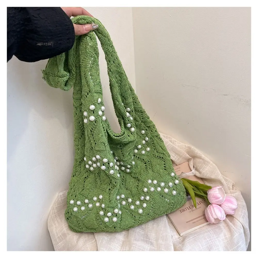 Fashion Hollow Out Women Knitting Shoulder Bag Beaded Decoration Portable Beach Tote Bag Soft Simple Shopping Handbags Summer
Fashion Hollow Out Women Knitting Shoulder Bag Beaded Decoration Portable Beach Tote Bag Soft Simple Shopping Handbags Summer