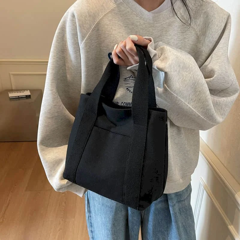 Холщовые сумки, новинка 2025 года, многоразовые водонепроницаемые сумки, повседневные однотонные дизайнерские вместительные студенческие школьные сумки в японском стиле для женщин
Холщовые сумки, новинка 2025 года, многоразовые водонепроницаемые сумки, повседневные однотонные дизайнерские вместительные студенческие школьные сумки в японском стиле для женщин