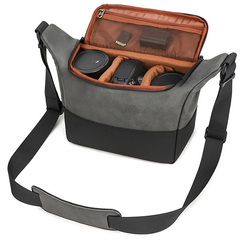 Hot-selling SLR camera bag PU leather outdoor waterproof photography bag shoulder crossbody photography bag digital camera bag
Hot-selling SLR camera bag PU leather outdoor waterproof photography bag shoulder crossbody photography bag digital camera bag