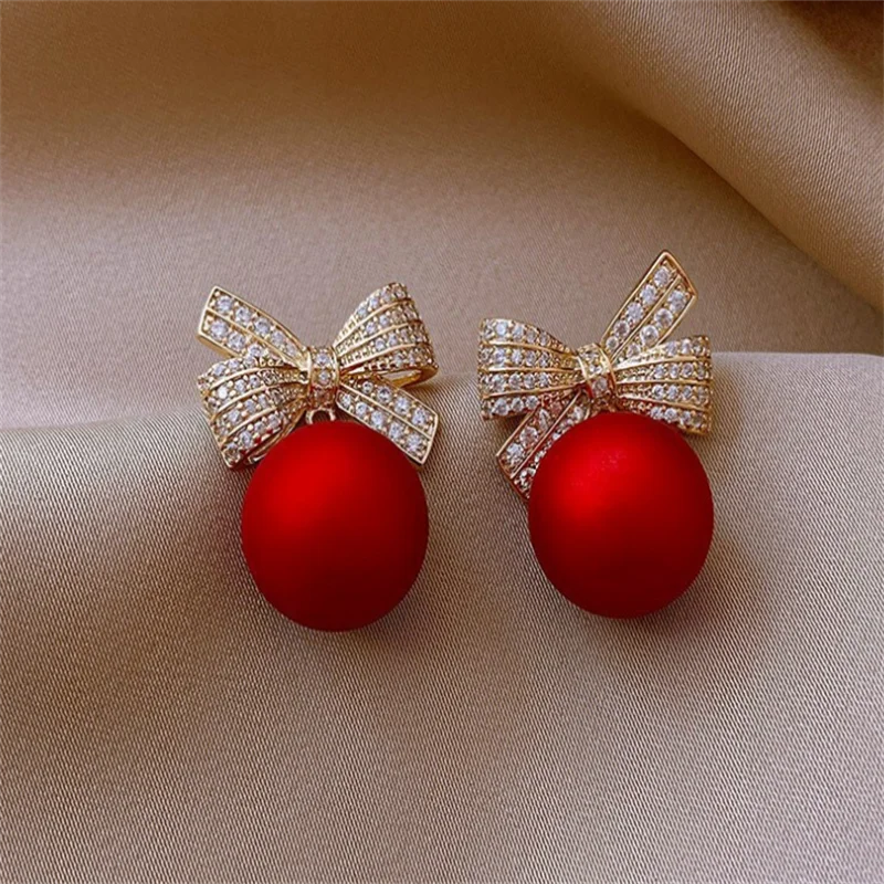 Fashion Bow shaped round bead studded diamond earrings for Christmas women's fashion earrings
Fashion Bow shaped round bead studded diamond earrings for Christmas women's fashion earrings