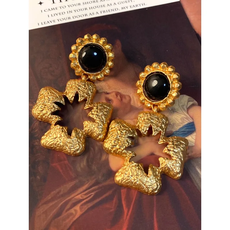 Nordic style retro hollow relief cross sunflower stud earrings 
Nordic style retro hollow relief cross sunflower stud earrings