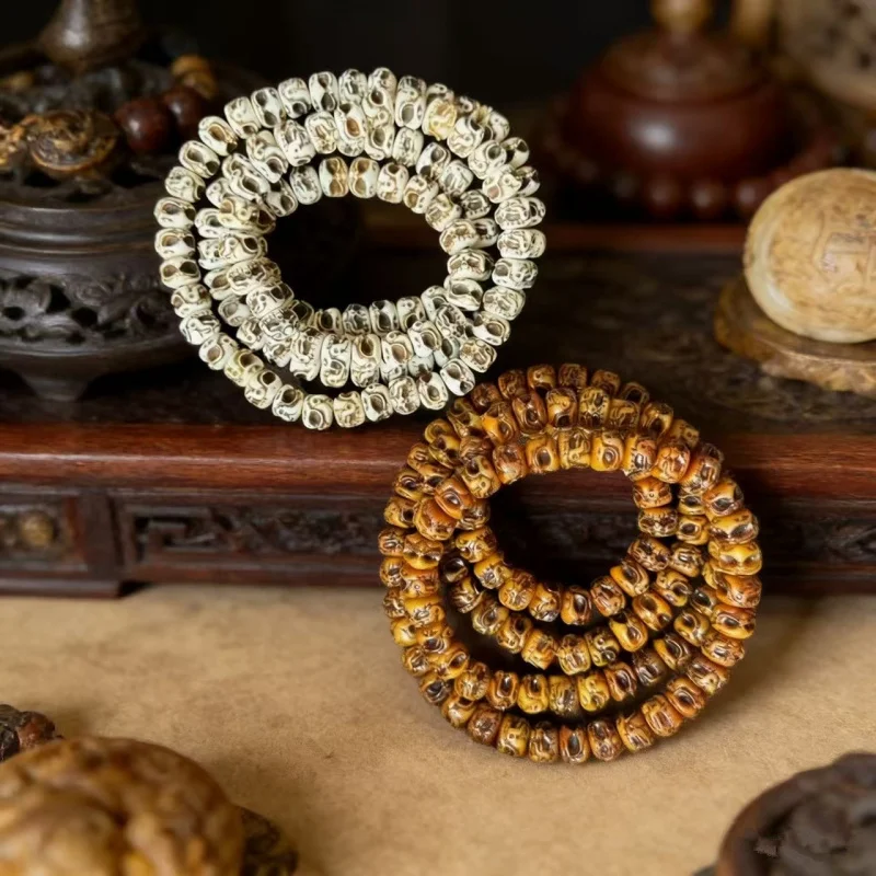 Tibetan-style yak bone double-sided 108-bead long string of Buddhist beads with a Pekkophee and an A-dai design
Tibetan-style yak bone double-sided 108-bead long string of Buddhist beads with a Pekkophee and an A-dai design