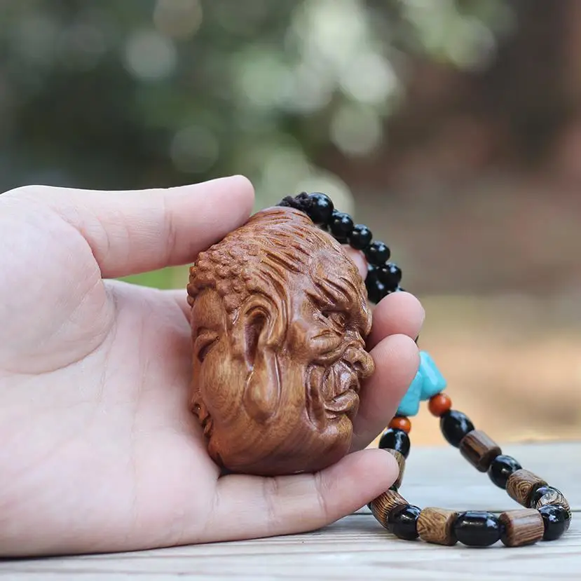 A read between Buddha and magic natural solid wood carving men portable disc play hand piece play car pendant-Figurines
A read between Buddha and magic natural solid wood carving men portable disc play hand piece play car pendant-Figurines