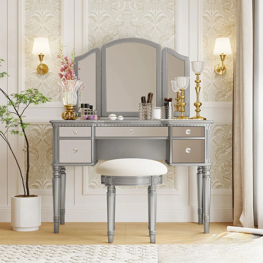 Brand new custom, silver/gold 43-inch dresser set with mirrored drawers and stool
Brand new custom, silver/gold 43-inch dresser set with mirrored drawers and stool