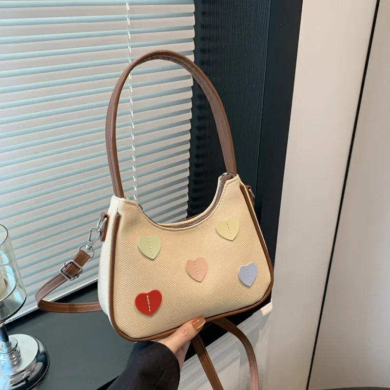 Korean version of fashionable small fresh armpit bag high value peach heart casual versatile shoulder messenger bag
Korean version of fashionable small fresh armpit bag high value peach heart casual versatile shoulder messenger bag