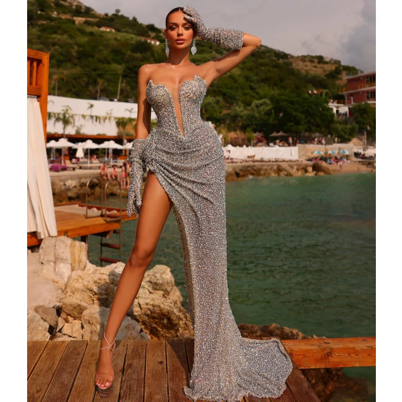 Sliver Shining Sequin Fashionable Gloves High Slit Strapless Floor Length Dress Wedding Party Dress Stage Performan Costume
Sliver Shining Sequin Fashionable Gloves High Slit Strapless Floor Length Dress Wedding Party Dress Stage Performan Costume