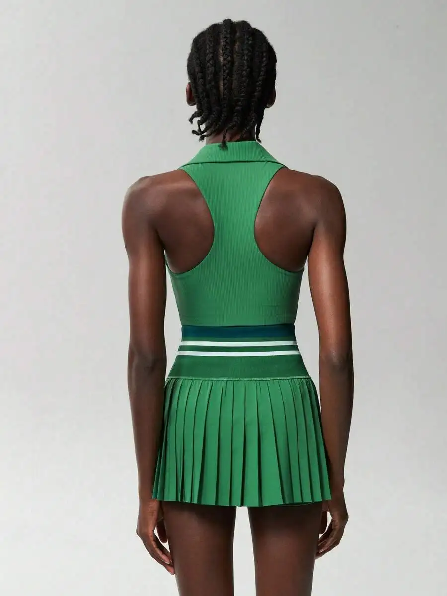 Womens Tennis Dress Set Sleeveless Top Pleated Mini Skirt Breathable Quick Dry Sportswear
Womens Tennis Dress Set Sleeveless Top Pleated Mini Skirt Breathable Quick Dry Sportswear