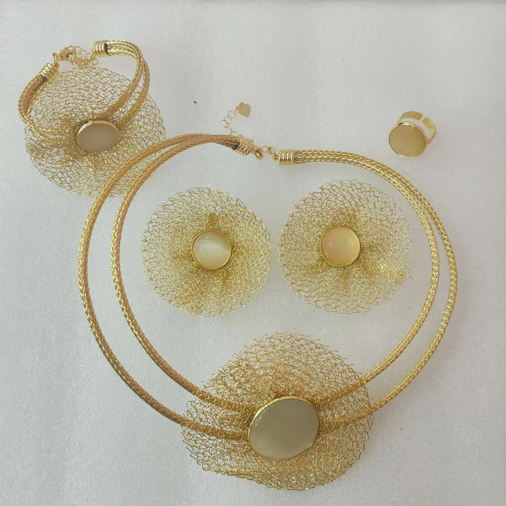 Italy Lady Gold Plated Jewelry Set Trend Design Round Necklace Earrings Bracelet Ring Light Luxury for Women Clothing Wedding
Italy Lady Gold Plated Jewelry Set Trend Design Round Necklace Earrings Bracelet Ring Light Luxury for Women Clothing Wedding