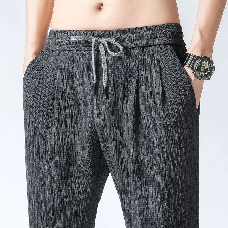Summer Ultrathin Ice Silk Loose Cotton Trousers Ninth Pants Youth Faion Long Pants for Men
Summer Ultrathin Ice Silk Loose Cotton Trousers Ninth Pants Youth Faion Long Pants for Men