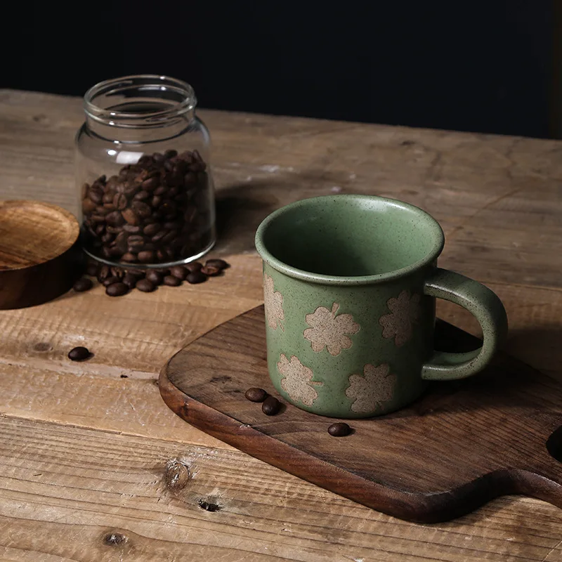 Artisan Ceramic Coffee Cup Small Stoneware Mug with Sesame Ash Glaze Clover Green Kiln Change Design Unique Handmade
Artisan Ceramic Coffee Cup Small Stoneware Mug with Sesame Ash Glaze Clover Green Kiln Change Design Unique Handmade