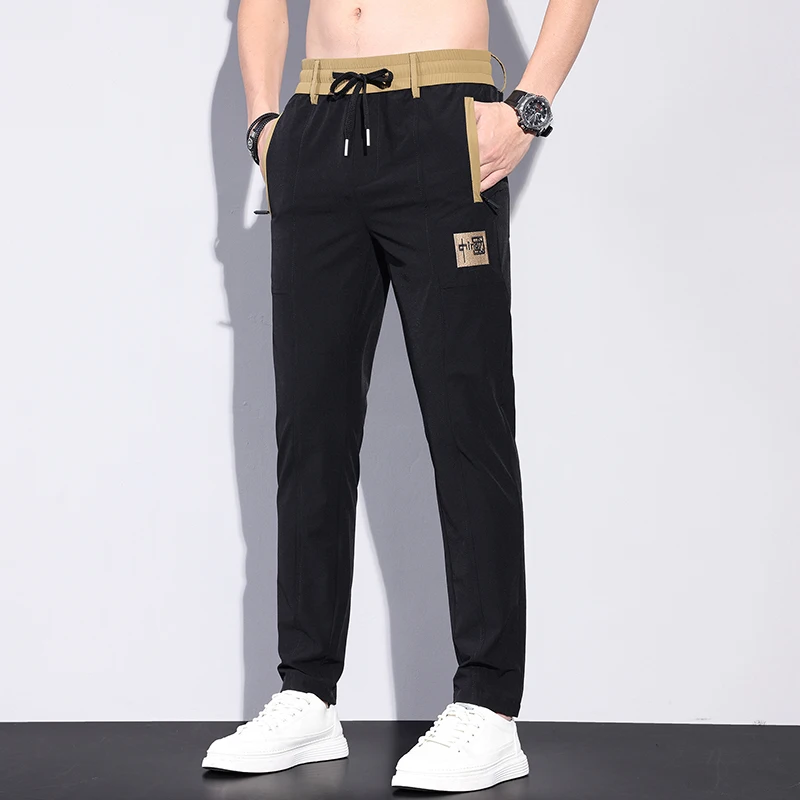 Новые китайские мужские спортивные брюки: повседневные, дышащие, с вышивкой, длинные, зауженные, для осени, весны и лета, модный бренд
Новые китайские мужские спортивные брюки: повседневные, дышащие, с вышивкой, длинные, зауженные, для осени, весны и лета, модный бренд