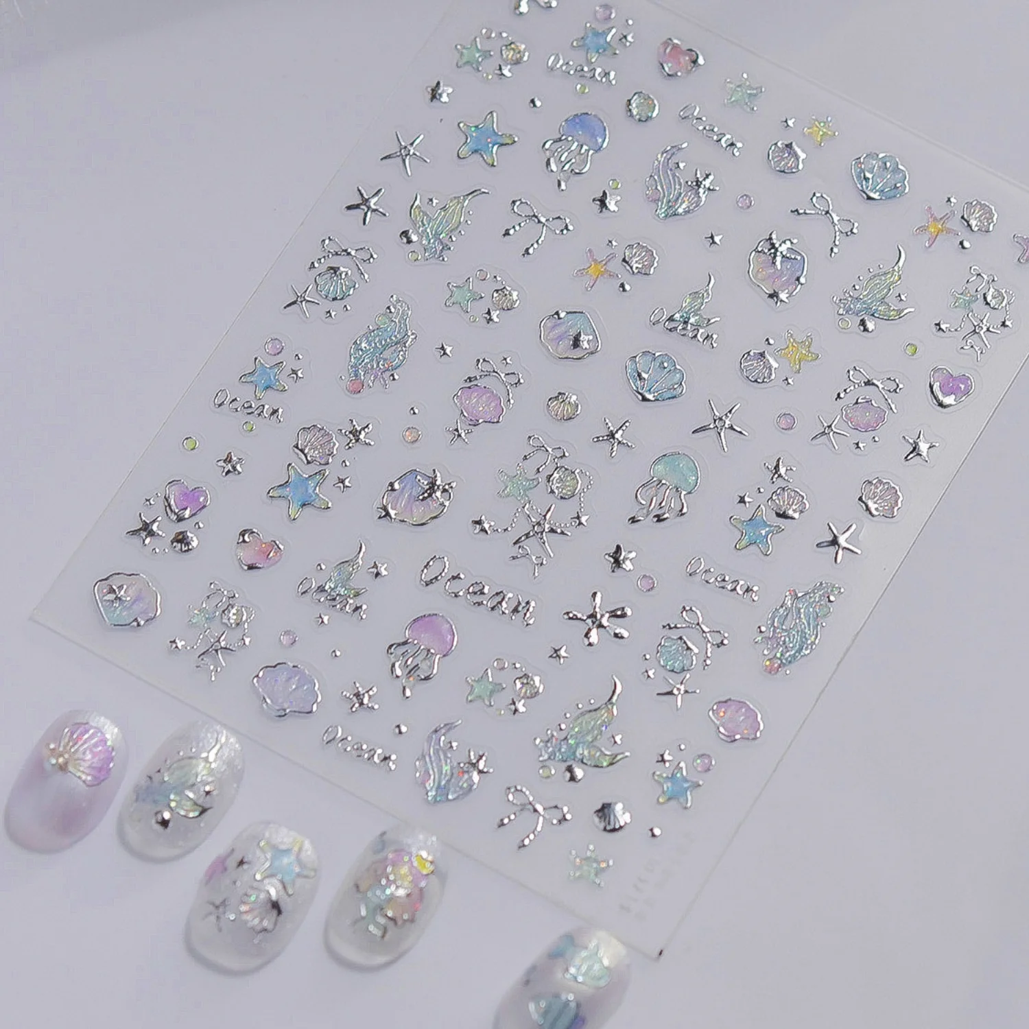 Dreamy Marine 5D Bronzing Nail Stickers Mermaid Jellyfish Octopus Conch Shell Ribbon Heart Star Bubble Water Ripple Nail Decor
Dreamy Marine 5D Bronzing Nail Stickers Mermaid Jellyfish Octopus Conch Shell Ribbon Heart Star Bubble Water Ripple Nail Decor