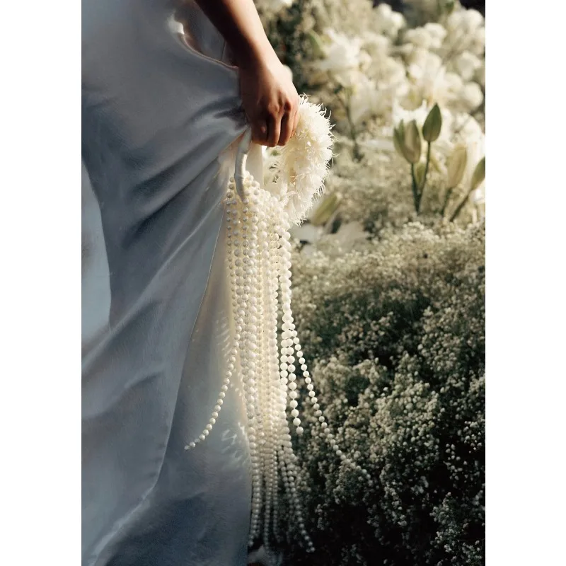 Bridal water drop bouquet wedding photography pearl bracelet bouquet
Bridal water drop bouquet wedding photography pearl bracelet bouquet