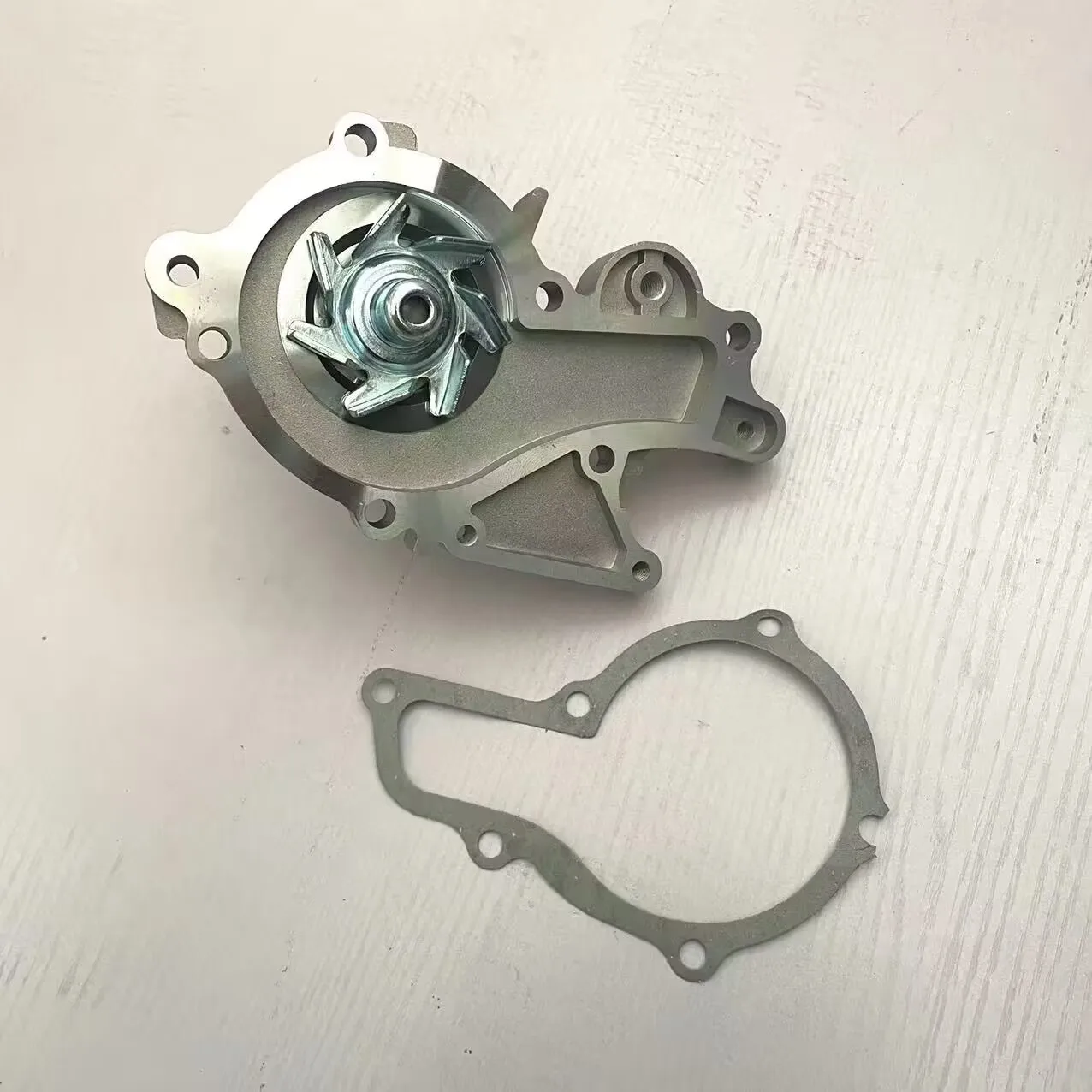 Auto parts High quality Water Pump EQ474i.1307010 for DFSK Dongfeng Sokon Engine 474 Mini Bus Truck Van Cargo Cooling System
Auto parts High quality Water Pump EQ474i.1307010 for DFSK Dongfeng Sokon Engine 474 Mini Bus Truck Van Cargo Cooling System