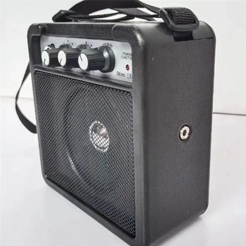 A69P-5W Mini Guitar Amplifier Amp Speaker With 3.5Mm & 6.35Mm Inputs 1/4 Inch Output With Volume Tone Adjustment Overdrive
A69P-5W Mini Guitar Amplifier Amp Speaker With 3.5Mm & 6.35Mm Inputs 1/4 Inch Output With Volume Tone Adjustment Overdrive