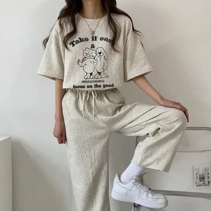 O-neck Cartoon Printed Tops Straight Pants Two Peices Sets Women Slim Casual Tshirt And Pants Sets 2025 Summer Lady Tracksuits
O-neck Cartoon Printed Tops Straight Pants Two Peices Sets Women Slim Casual Tshirt And Pants Sets 2025 Summer Lady Tracksuits