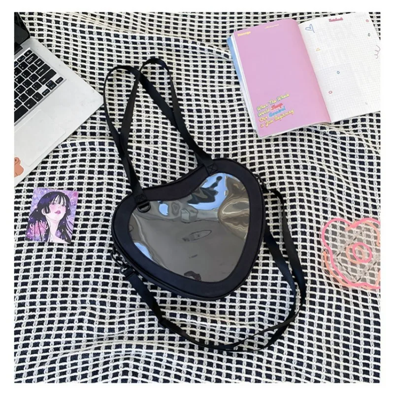 Simple Heart-shaped Transparent Shoulder Bag JK Uniform Bag Girl Shoulder Bag 6 Colors Cute Backpack
Simple Heart-shaped Transparent Shoulder Bag JK Uniform Bag Girl Shoulder Bag 6 Colors Cute Backpack