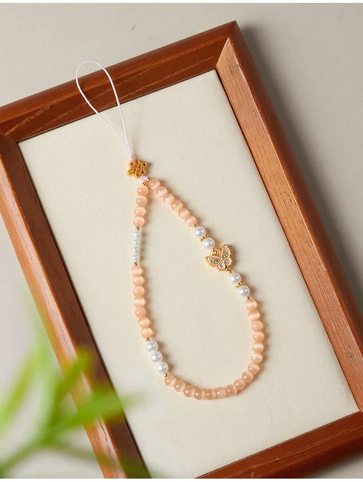 Элегантный ремешок для телефона из бисера с веревочной цепочкой и подвеской из камня «кошачий глаз» для мобильных аксессуаров
Элегантный ремешок для телефона из бисера с веревочной цепочкой и подвеской из камня «кошачий глаз» для мобильных аксессуаров