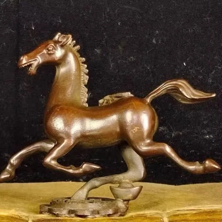 old copper "Win Now" ornament is a text player who immediately seals tea pet ornament on table
old copper "Win Now" ornament is a text player who immediately seals tea pet ornament on table