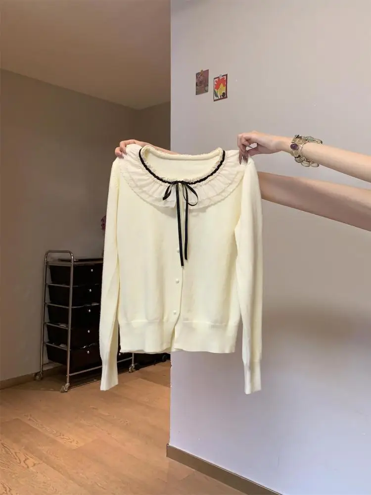 Autumn Winter Women Sweet Solid Ruffles Cardigan Sweater French Fashion Long Sleeve Single Breasted Round Neck Knitted Tops Chic
Autumn Winter Women Sweet Solid Ruffles Cardigan Sweater French Fashion Long Sleeve Single Breasted Round Neck Knitted Tops Chic