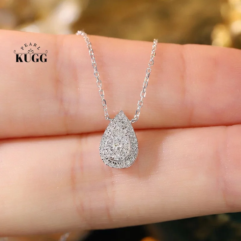 KUGG 100% ожерелье из белого золота 18 карат, 0,16 карата, ожерелье с подвеской из настоящего натурального бриллианта для женщин, модный стиль INS, подарок на высокий день рождения
KUGG 100% ожерелье из белого золота 18 карат, 0,16 карата, ожерелье с подвеской из настоящего натурального бриллианта для женщин, модный стиль INS, подарок на высокий день рождения