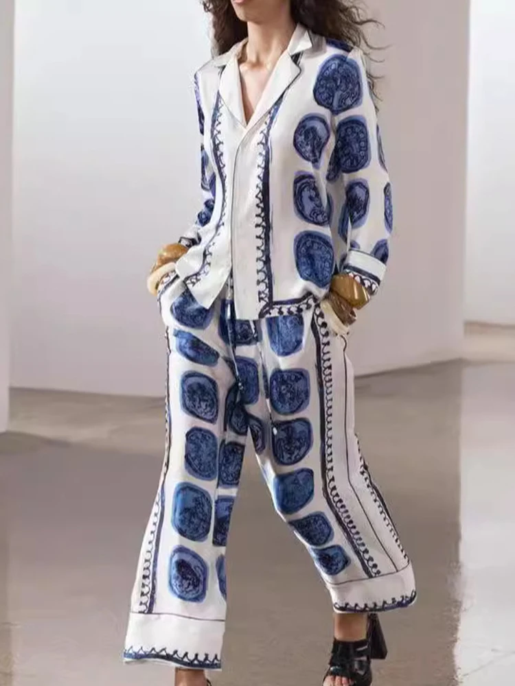 Элегантный комплект из рубашки с отложным воротником и длинных брюк для женщин, повседневный, с длинным рукавом, 2 предмета, модный принт, свободный крой, костюм-рубашка
Элегантный комплект из рубашки с отложным воротником и длинных брюк для женщин, повседневный, с длинным рукавом, 2 предмета, модный принт, свободный крой, костюм-рубашка