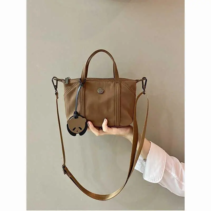 Tote Bag Nylon Lightweight oulder Women's Bag Faionable Versatile Small Pa Casual Dumpling ape Handbag
Tote Bag Nylon Lightweight oulder Women's Bag Faionable Versatile Small Pa Casual Dumpling ape Handbag