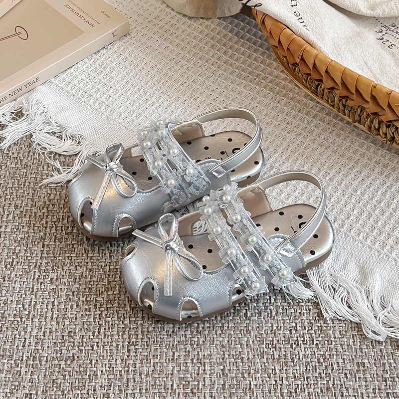 Girls Casual Shoes Simple Bows Kids Princess Beach Shoes Hollowed-out 2026 Summer New Children Sandals Korean Style Sweet
Girls Casual Shoes Simple Bows Kids Princess Beach Shoes Hollowed-out 2026 Summer New Children Sandals Korean Style Sweet